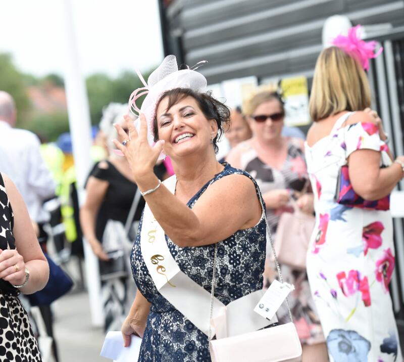 A bride to be showing off her engagement ring at her hen do at Uttoxeter Races