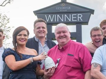 Members of the Optimum Pay Group posing for a photo.