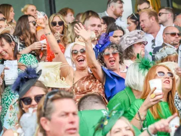 The crowd in the grandstands at Uttoxeter watching the race